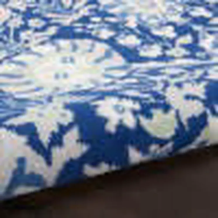 6' X 9' Blue And Ivory Floral Area Rug