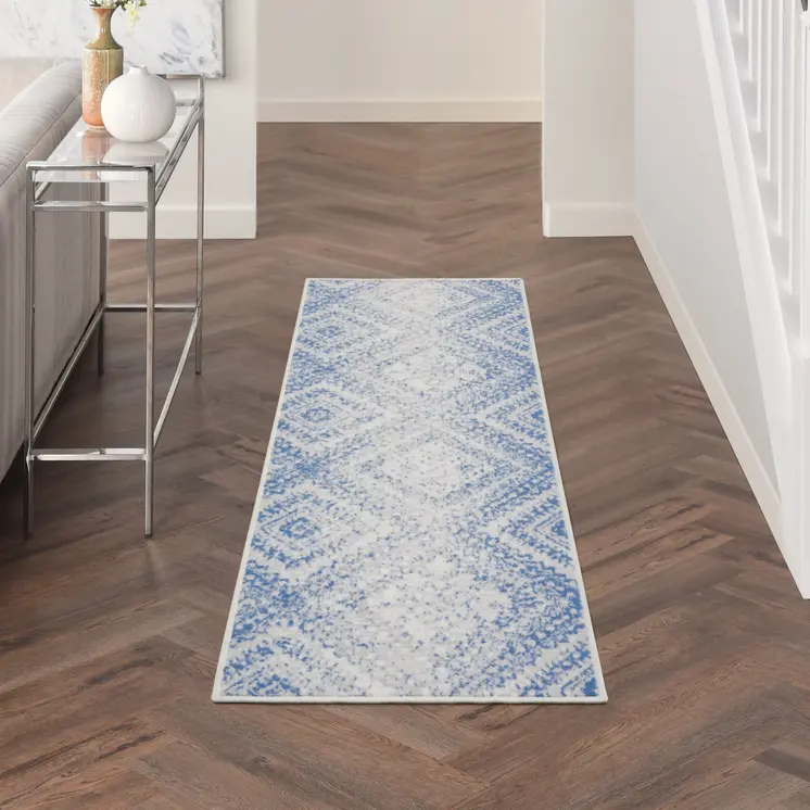5' X 7' Ivory And Blue Geometric Area Rug