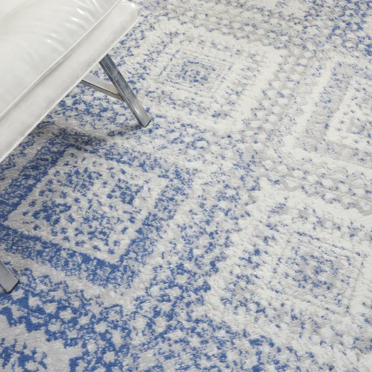 6' X 9' Ivory And Blue Geometric Area Rug