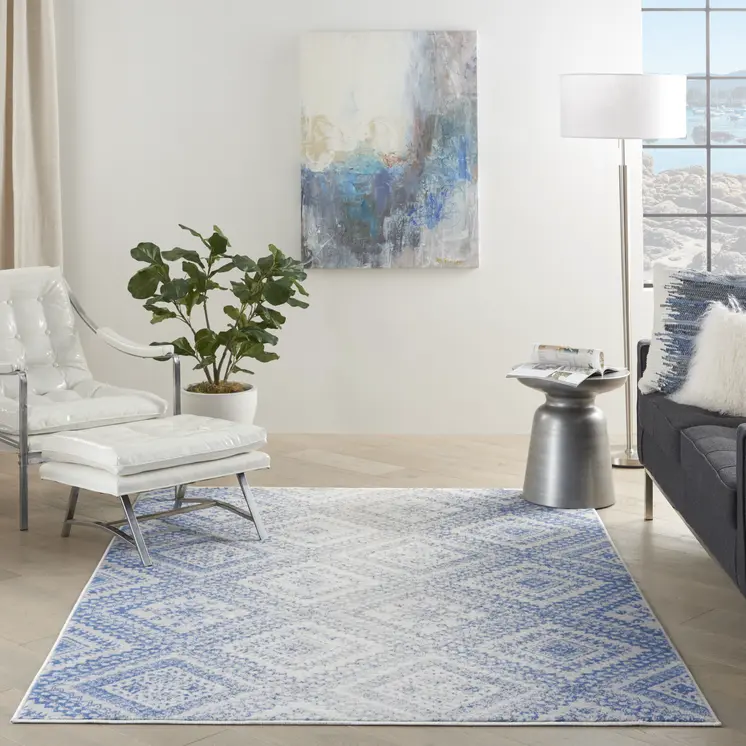 6' X 9' Ivory And Blue Geometric Area Rug