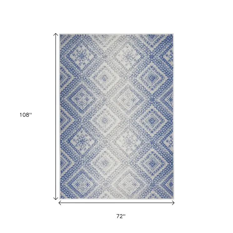 6' X 9' Ivory And Blue Geometric Area Rug