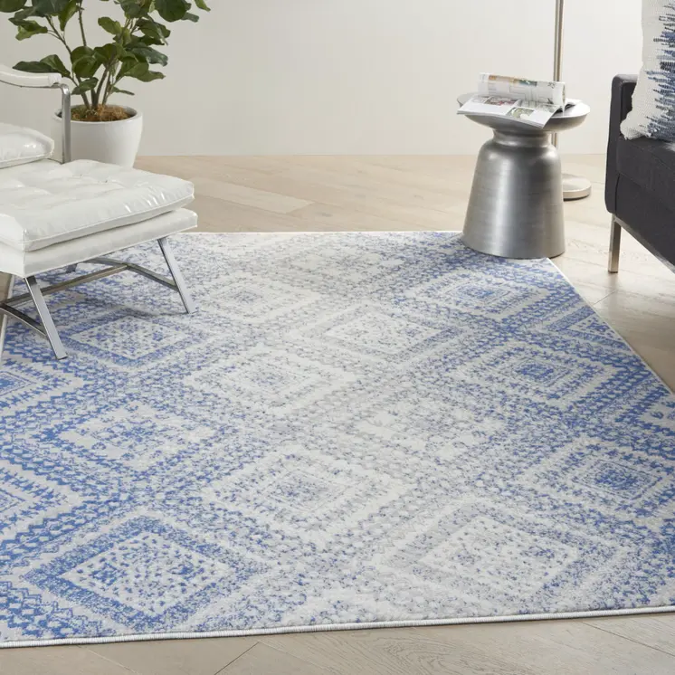 6' X 9' Ivory And Blue Geometric Area Rug