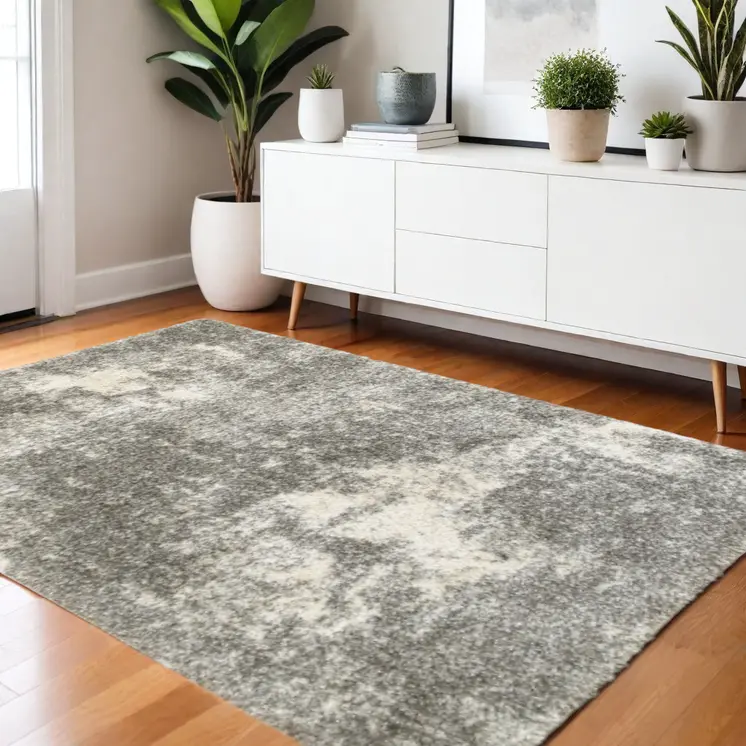 4' X 6' Gray And Ivory Distressed Abstract Area Rug