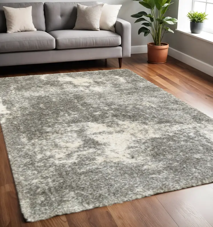 5' X 8' Gray And Ivory Distressed Abstract Area Rug