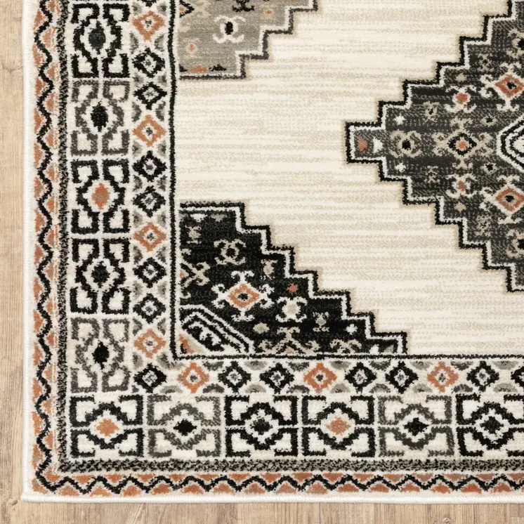 4' X 6' Ivory Black Orange And Gray Geometric Area Rug
