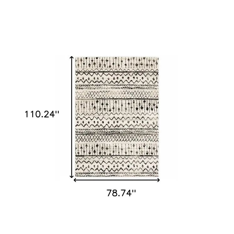 7' X 9' Ivory And Black Abstract Geometric Area Rug