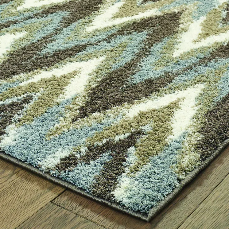 7' X 10' Gray And Taupe Ikat Pattern Area Rug