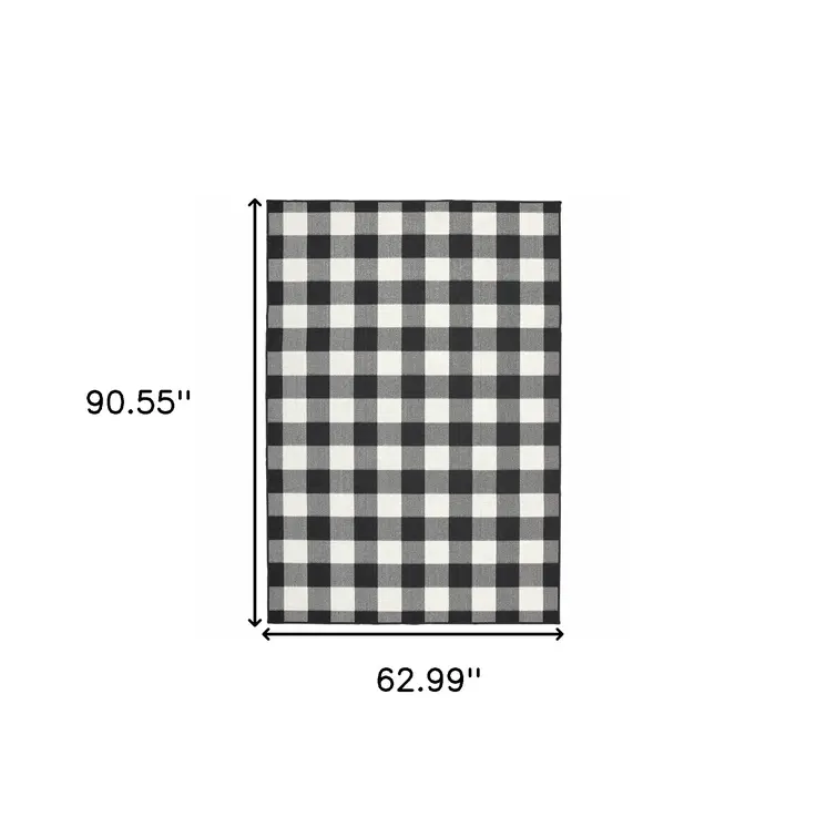 5' X 8' Black And Ivory Indoor Outdoor Area Rug