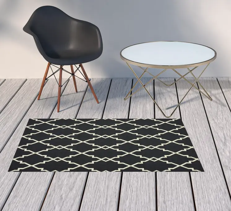 2' X 4' Black And Ivory Indoor Outdoor Area Rug