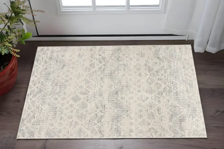2' X 3' Ivory Distressed Ikat Pattern Scatter Rug