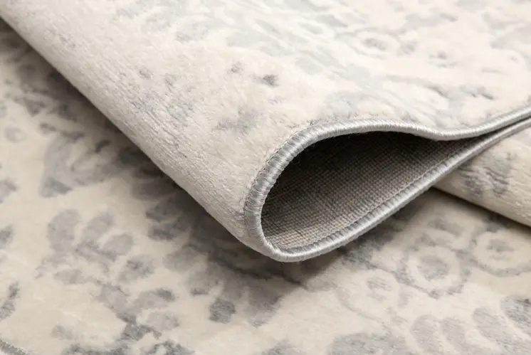 5' X 8' Ivory Distressed Ikat Pattern Area Rug
