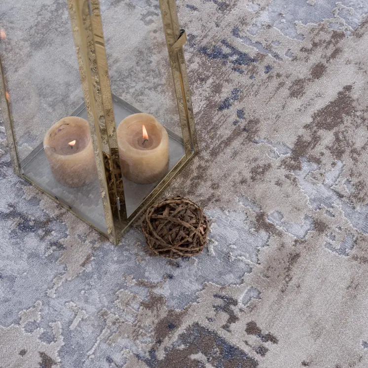 5' X 8' Beige And Ivory Abstract Area Rug