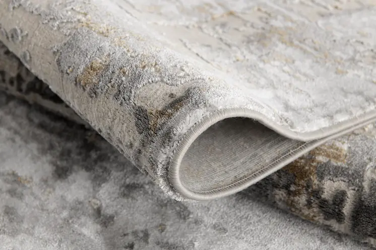 7' X 10' Beige And Gray Distressed Area Rug
