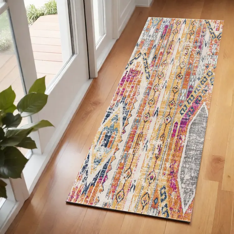 2' X 6' Gold And Ivory Southwestern Area Rug