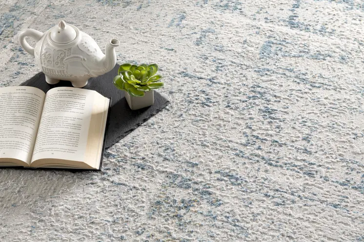 5' X 7' Blue and Ivory Abstract Area Rug