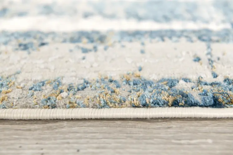 5' X 7' Blue and Ivory Abstract Area Rug