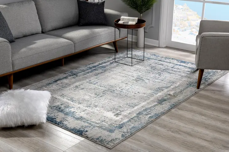 5' X 7' Blue and Ivory Abstract Area Rug