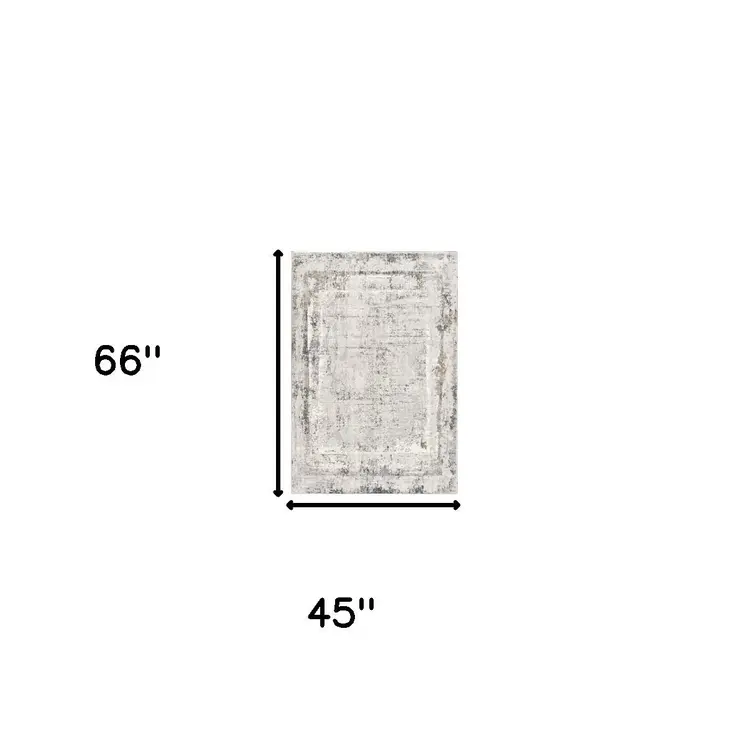 4' X 6' Gray and Ivory Abstract Power Loom Area Rug