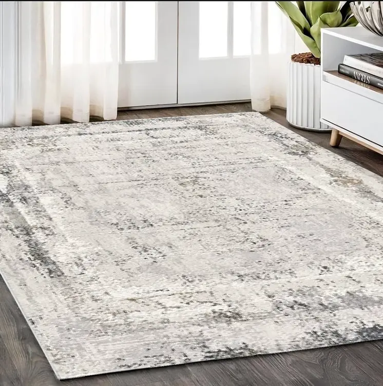 5' X 8' Gray and Ivory Abstract Power Loom Area Rug