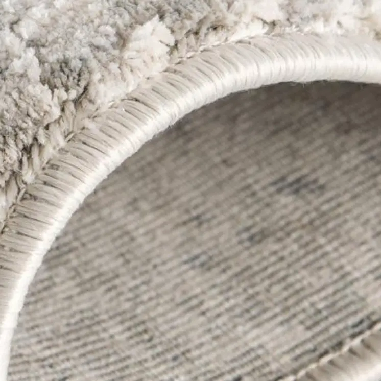 5' X 7' Gray and Ivory Abstract Area Rug