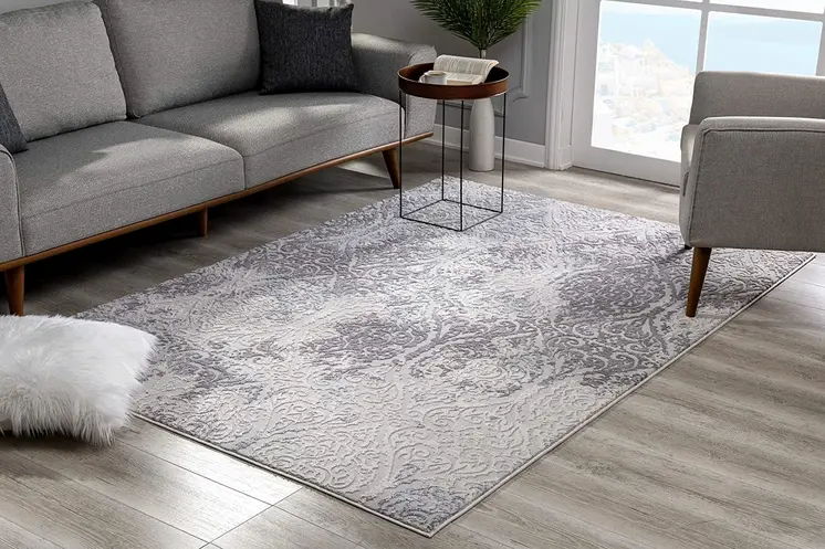 7' X 10' Cream And Gray Tinted Ogee Pattern Area Rug