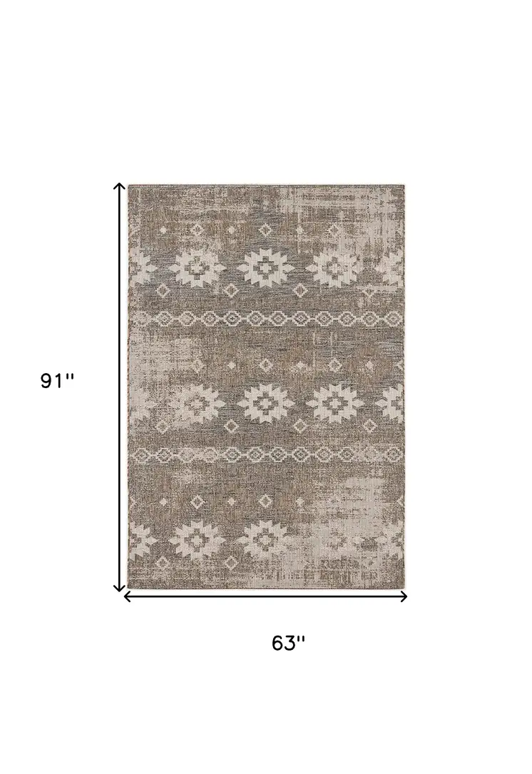 5' X 7' Gray and Ivory Ikat Area Rug