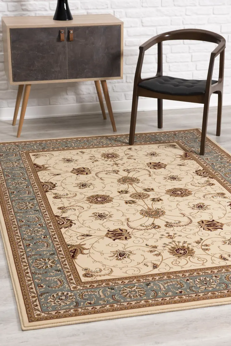7' X 9' Blue And Ivory Oriental Area Rug