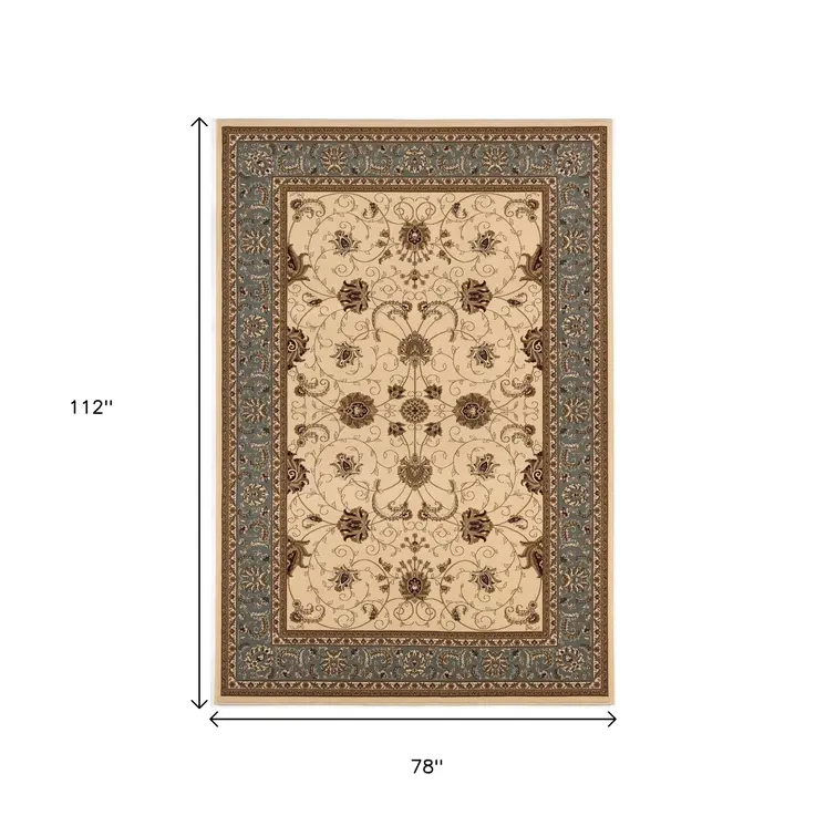 7' X 9' Blue And Ivory Oriental Area Rug