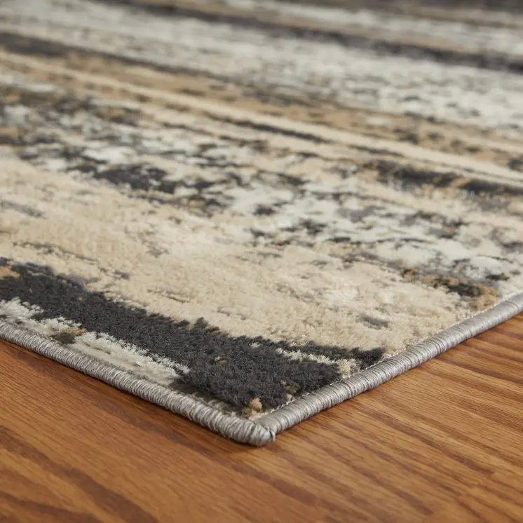 5' X 7' Beige Black And Gray Abstract Area Rug