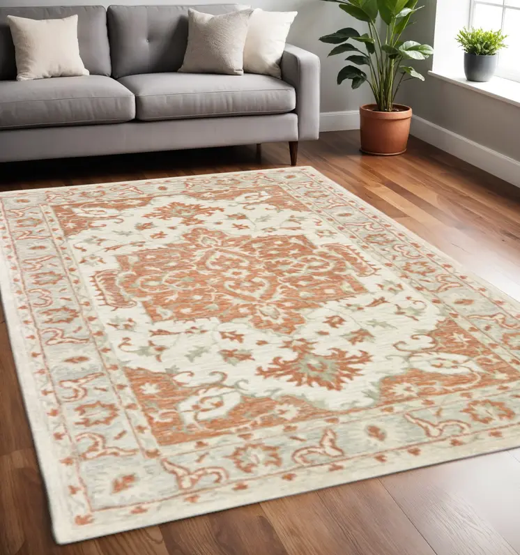 5' X 8' Orange and Ivory Medallion Area Rug