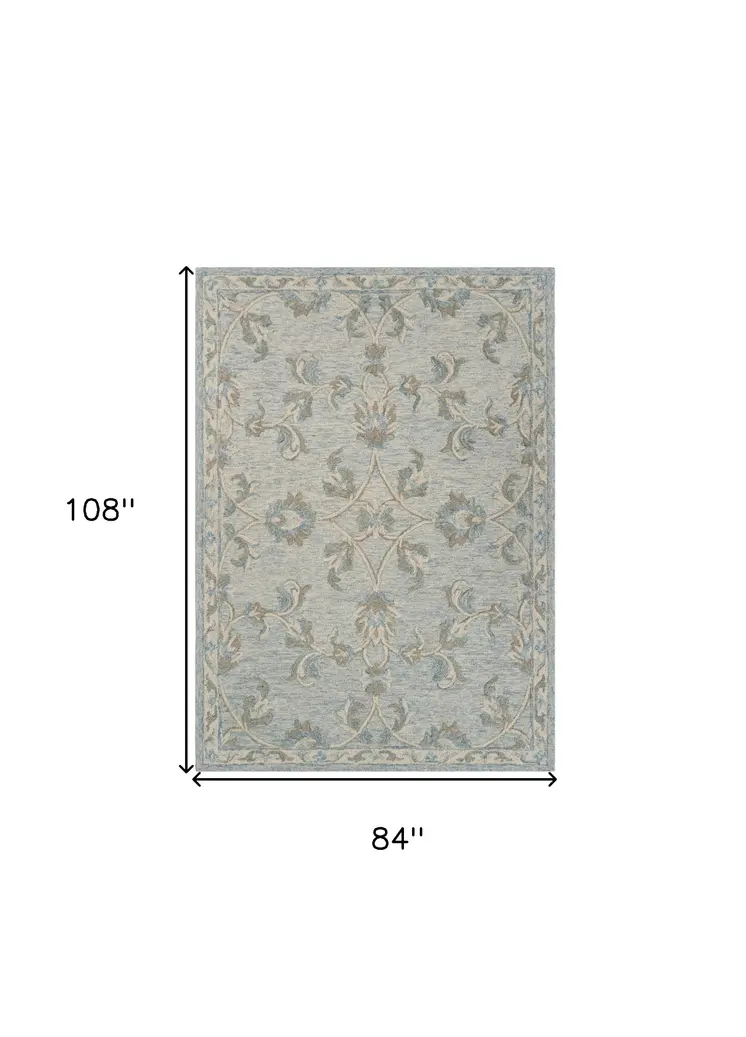 7' X 9' Blue And Ivory Wool Hand Tufted Area Rug