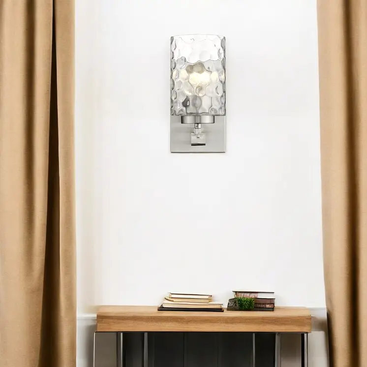 Silver Metal and Pebbled Glass Wall Sconce