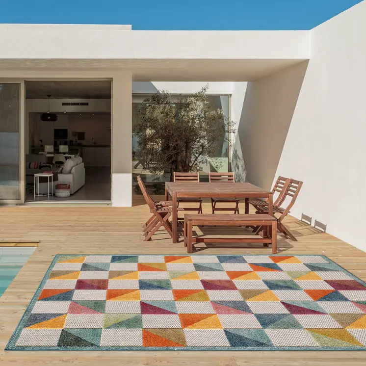 5' X 7' Orange And Ivory Indoor Outdoor Area Rug