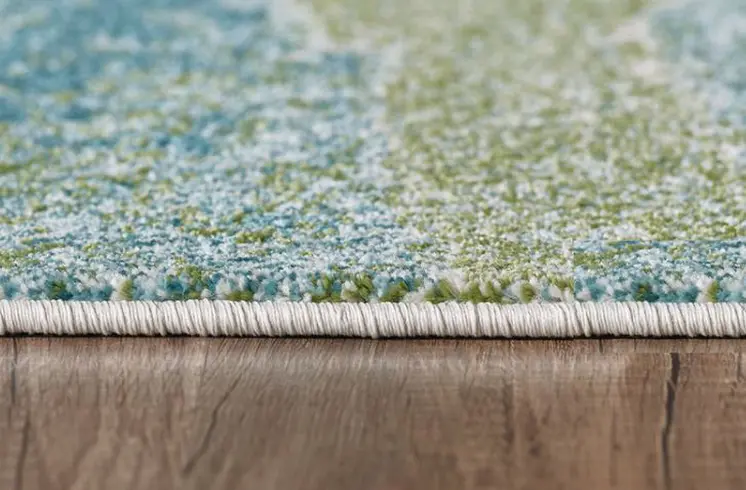 7' X 10' Blue And Sage Abstract Area Rug