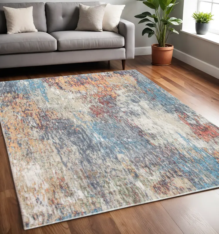 5' X 8' Blue and Beige Abstract Area Rug