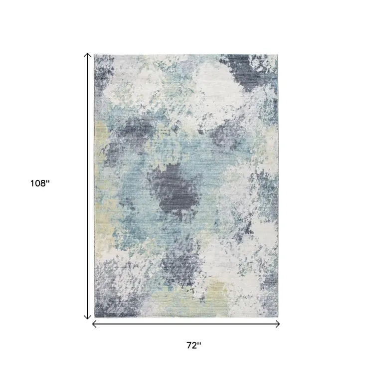 6' X 9' Blue and Ivory Abstract Area Rug