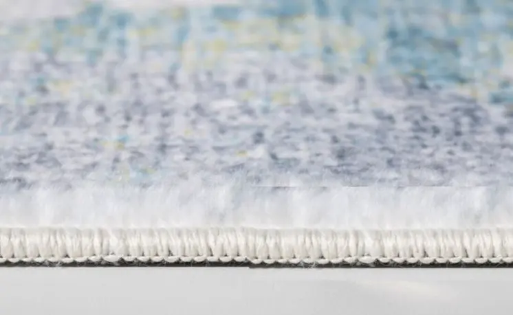 6' X 9' Blue and Ivory Abstract Area Rug