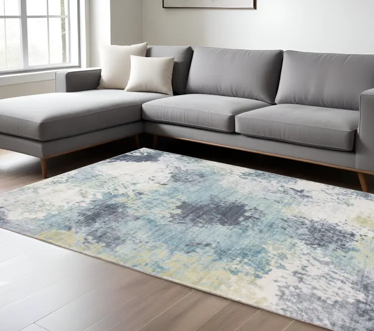 6' X 9' Blue and Ivory Abstract Area Rug