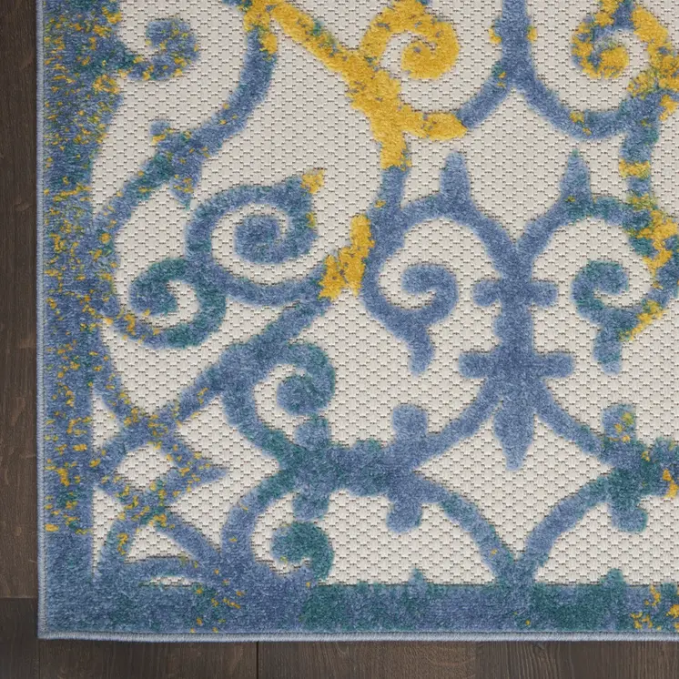 9' X 12' Ivory And Blue Indoor Outdoor Area Rug