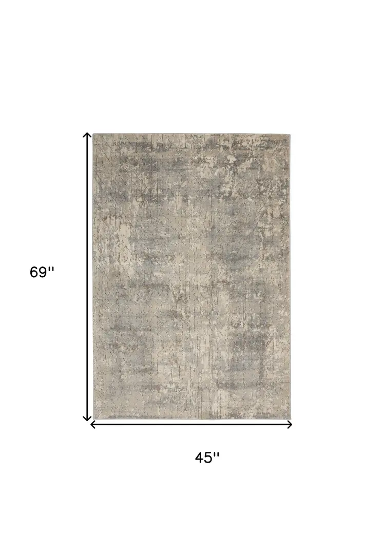 4' X 6' Beige And Grey Abstract Power Loom Non Skid Area Rug