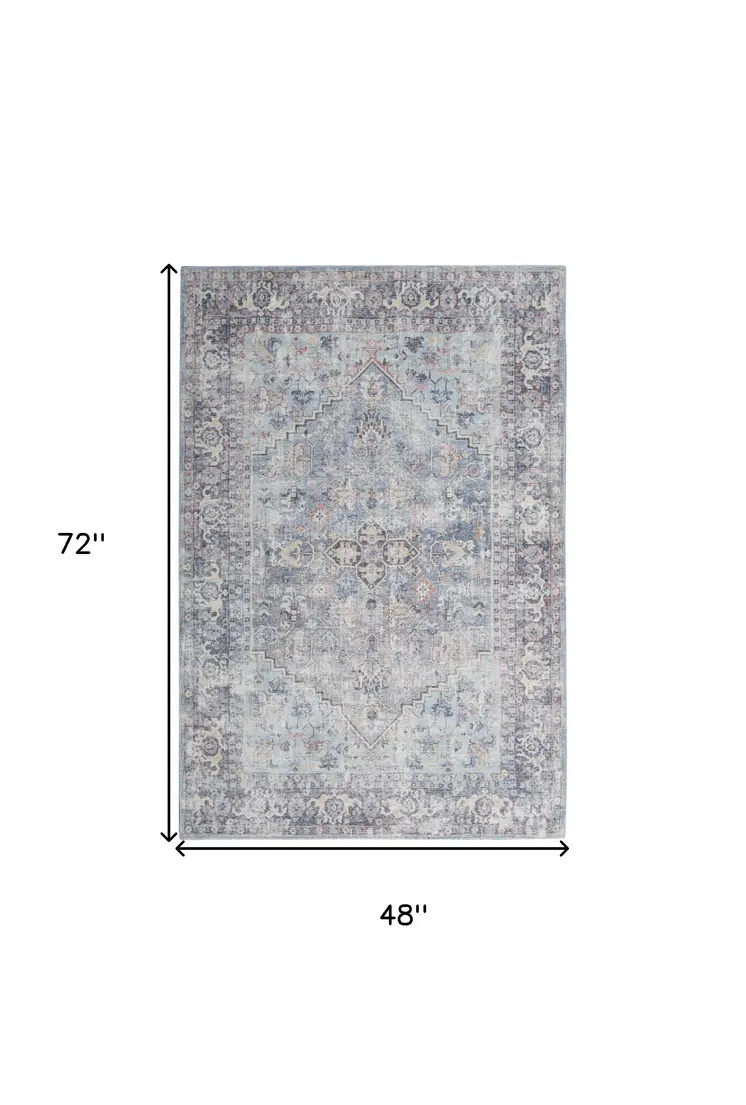 4' X 6' Light Grey And Blue Oriental Power Loom Distressed Washable Area Rug
