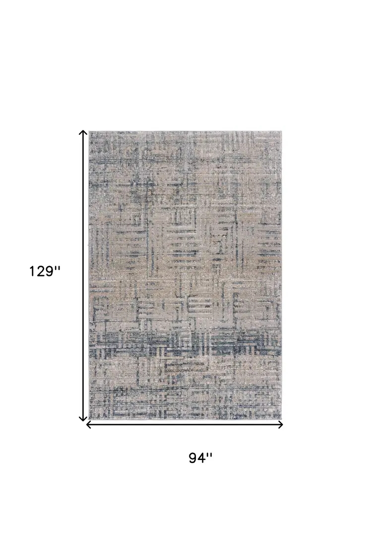 8' X 11' Cream Blue And Ivory Geometric Distressed Stain Resistant Area Rug