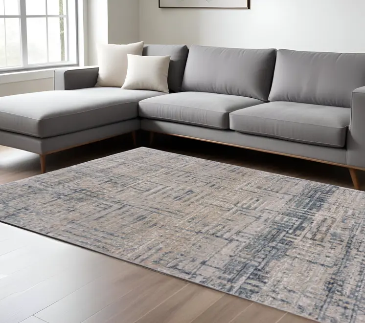 10' X 13' Cream Blue And Ivory Geometric Distressed Stain Resistant Area Rug