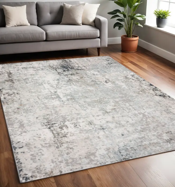5' X 7' Gray Cream And Taupe Abstract Distressed Stain Resistant Area Rug