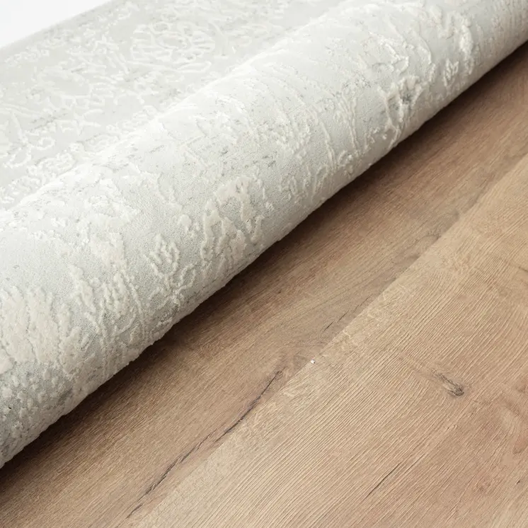 2' X 6' Ivory And Gray Floral Stain Resistant Area Rug
