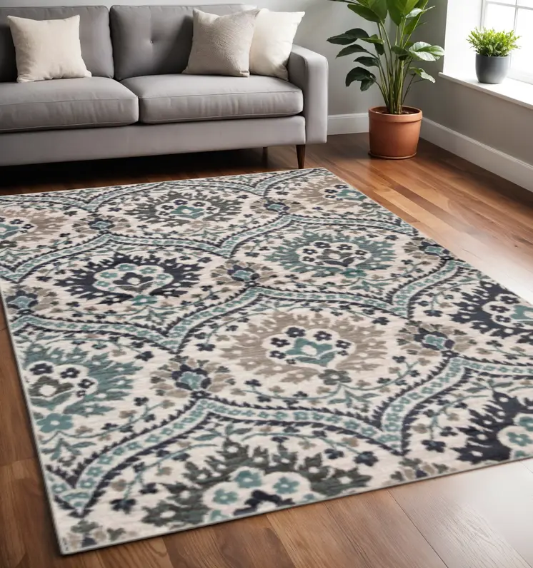 5' X 8' Ivory Blue And Gray Floral Stain Resistant Area Rug