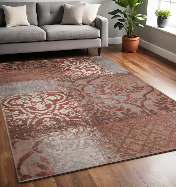 5' X 8' Rust And Gray Damask Distressed Stain Resistant Area Rug