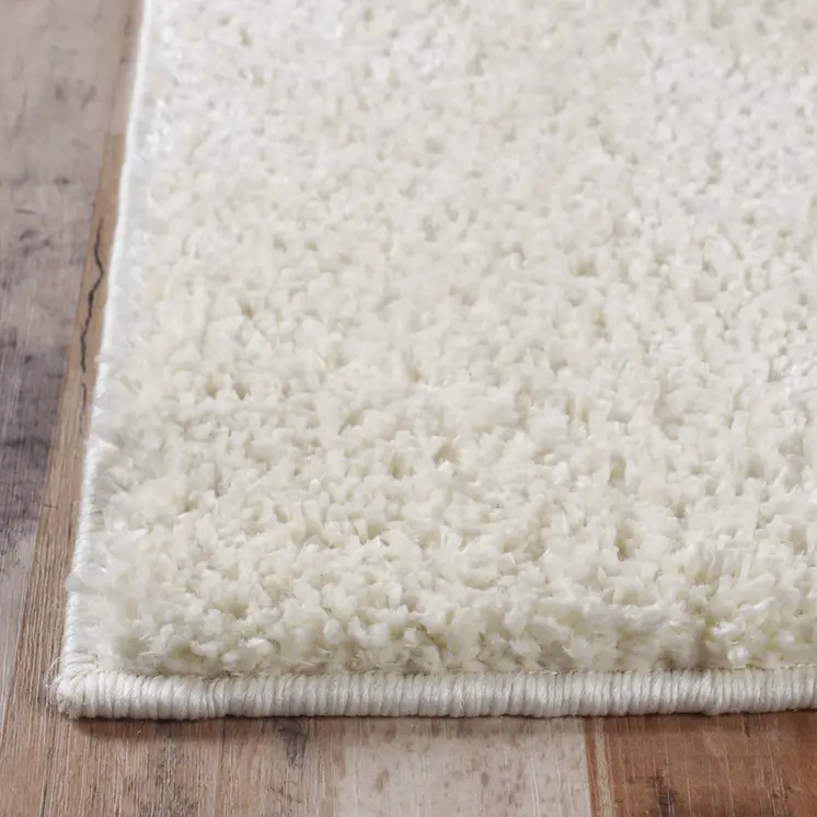 5' X 8' Ivory Shag Stain Resistant Area Rug