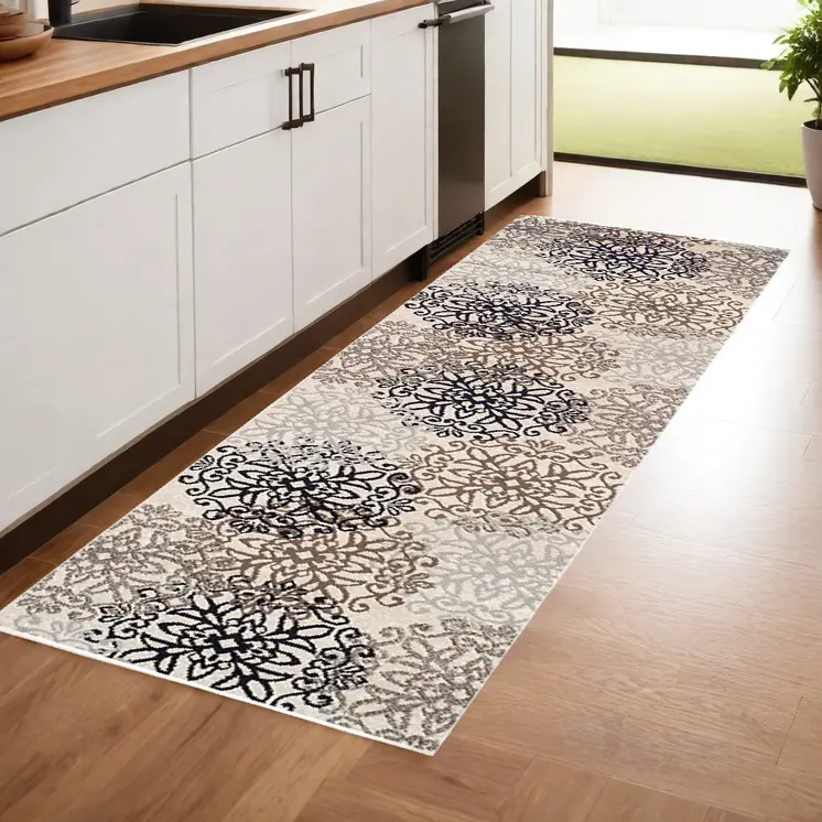 8' Tan Gray And Black Floral Medallion Stain Resistant Runner Rug
