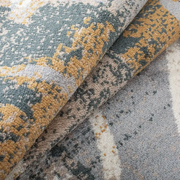 8' X 10' Beige And Gray Floral Power Loom Distressed Stain Resistant Area Rug